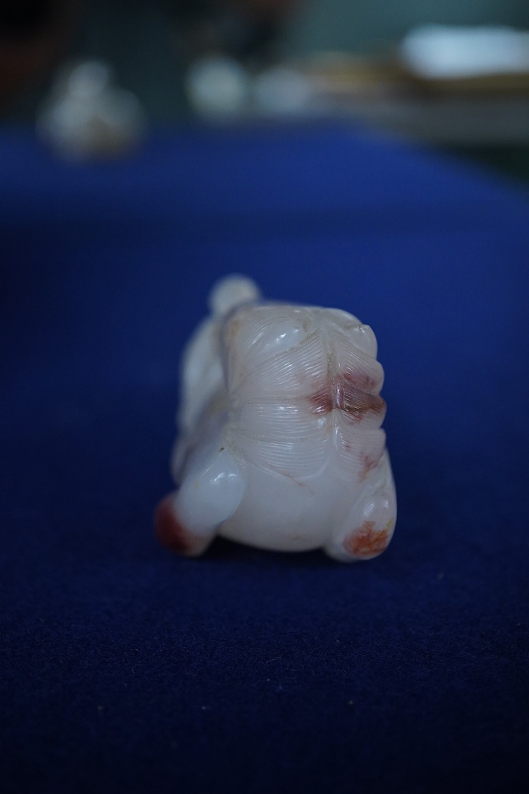 A Chinese agate carving of a horse and monkey, 8cm wide